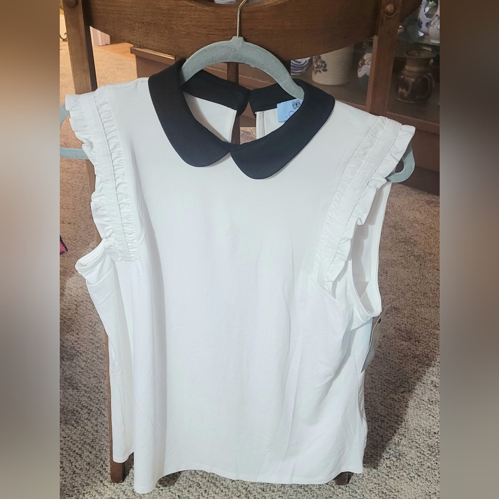 New CeCe brand blouse with tag. Size L